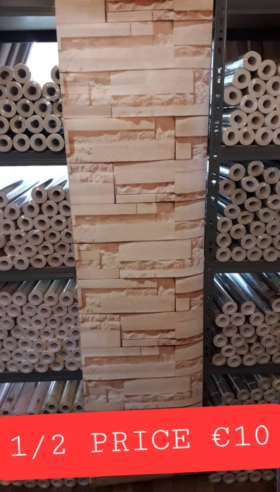 Peach 3D brick wallpaper by Budget Interiors showing textured peach-colored brick pattern for modern interior decor.