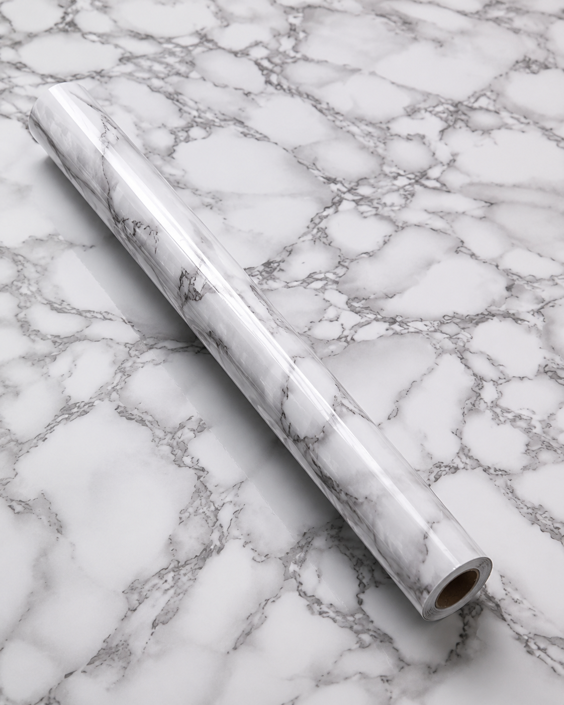 White and grey marble waterproof wallpaper roll by Budget Interiors, showcasing a large decorative marble pattern for walls.