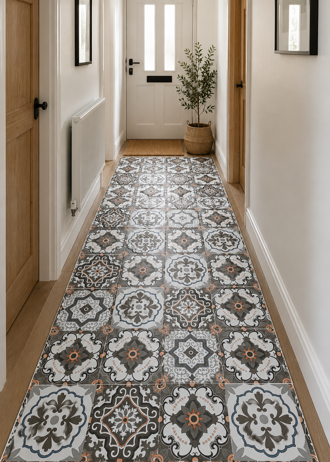 Budget Interiors mosaic tile effect stick-on roll for flooring, showing a close-up of the textured, colorful mosaic tile pattern.