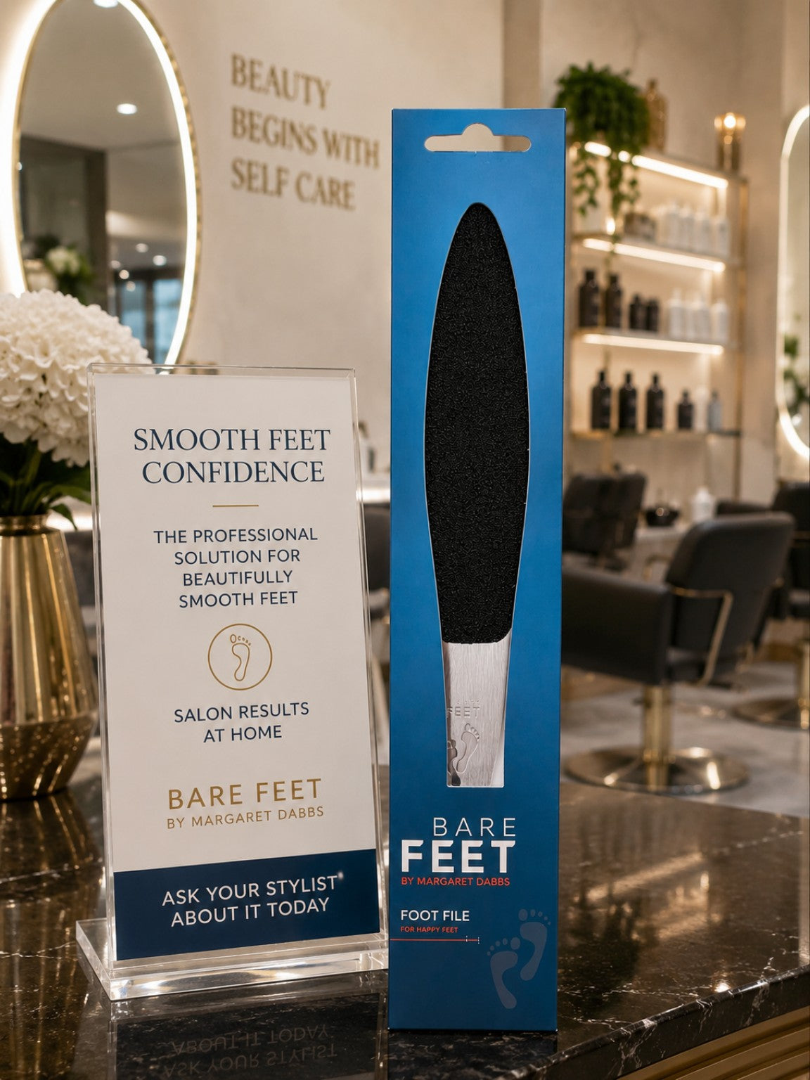 Professional Margaret Dabbs foot file by Budget Interiors, featuring a ergonomic handle and abrasive surface for smoothing feet.