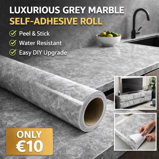 Grey marble slab from Budget Interiors showcasing unique veining and textures in a polished finish.