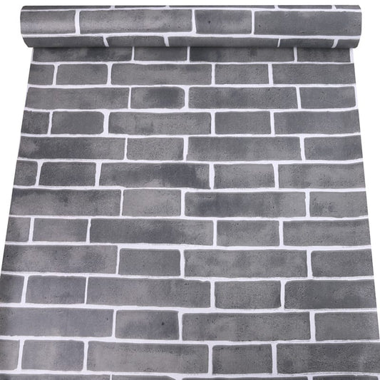 Grey tile from Budget Interiors showing a close-up of textured ceramic surface with subtle color variations.