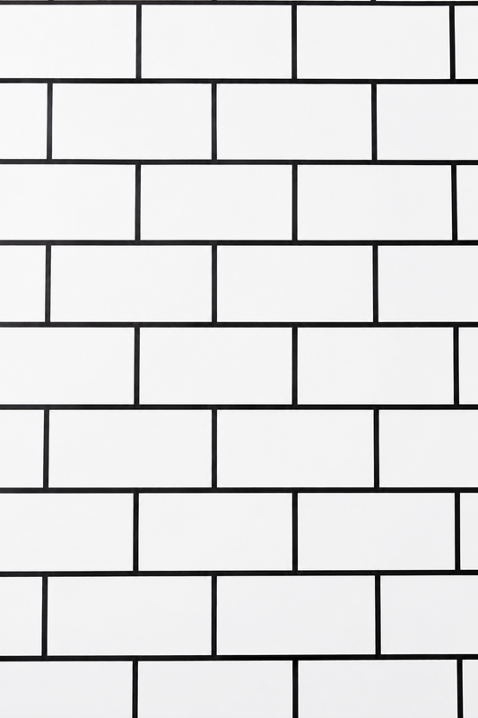 White tile extra large roll from Budget Interiors, showing a close-up of glossy, smooth ceramic tile surface for home decor.