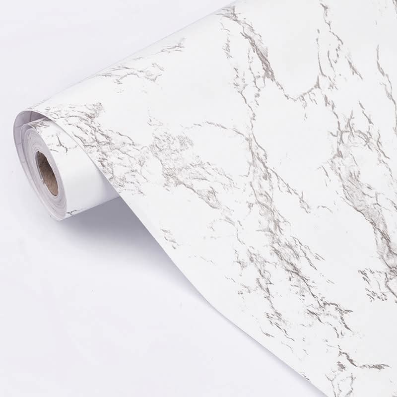 White and grey marble slab from Budget Interiors with natural veining and polished surface, ideal for countertops or decorative accents.