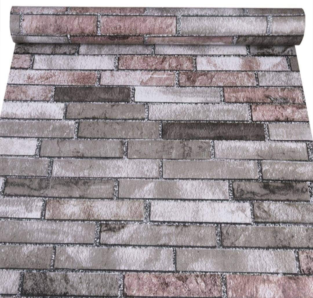 Close-up of Budget Interiors Mix Brick Wallpaper showcasing textured, multicolored brick pattern for interior wall decor.